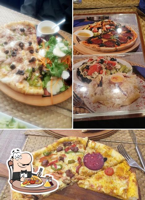 Try out pizza at La PIZ Hay Riad