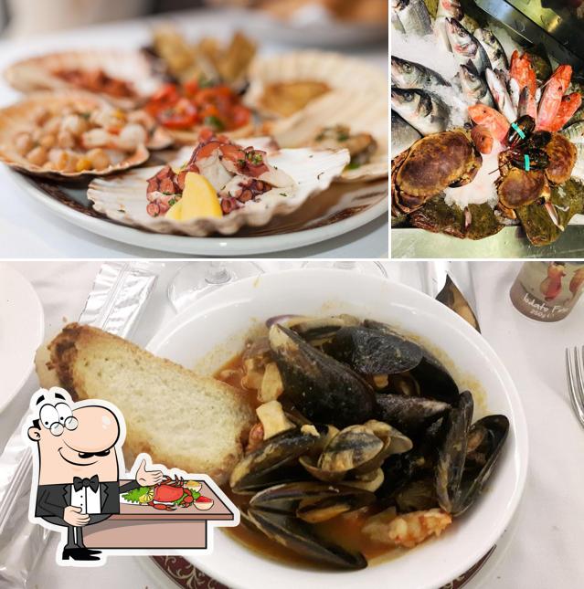Попробуйте блюда с морепродуктами в "Ristorante Da Gino Il Bonaparte"
