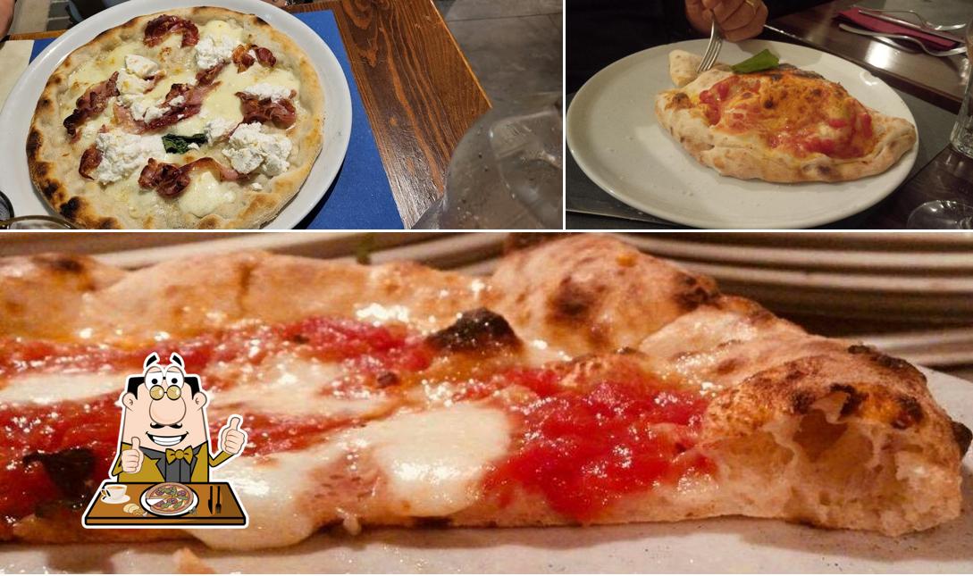 Try out pizza at Ristorante Porta Braschi