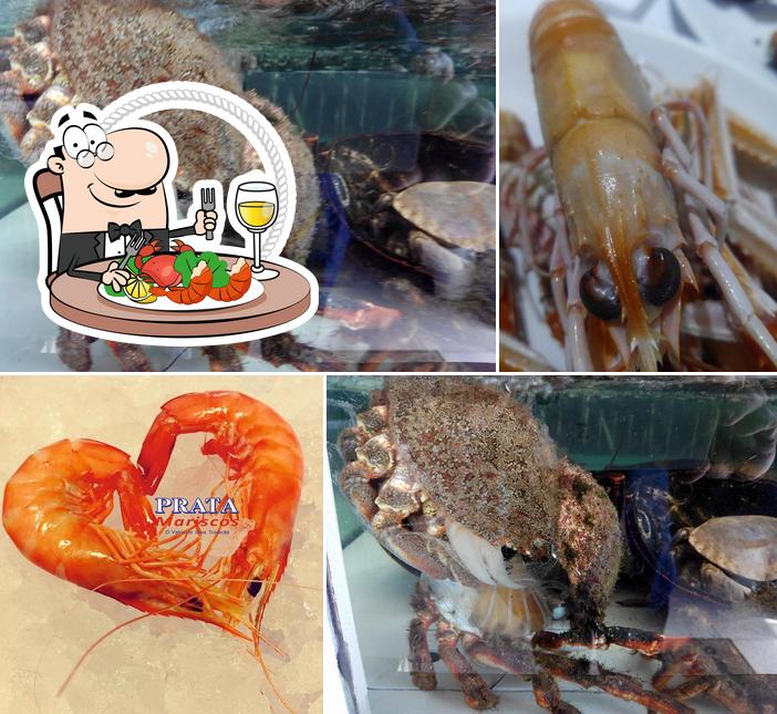 Peça diferentes itens de frutos do mar disponíveis no Prata Mariscos