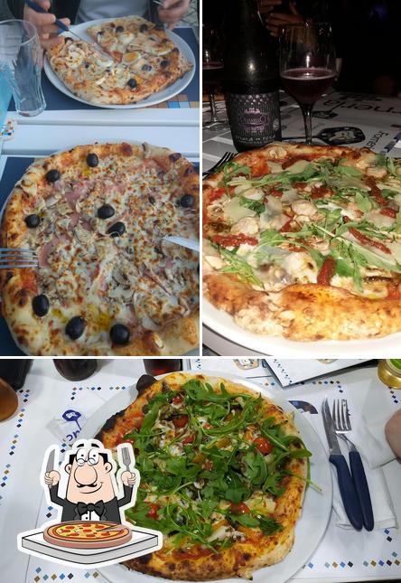 Get pizza at Restaurante Forneria