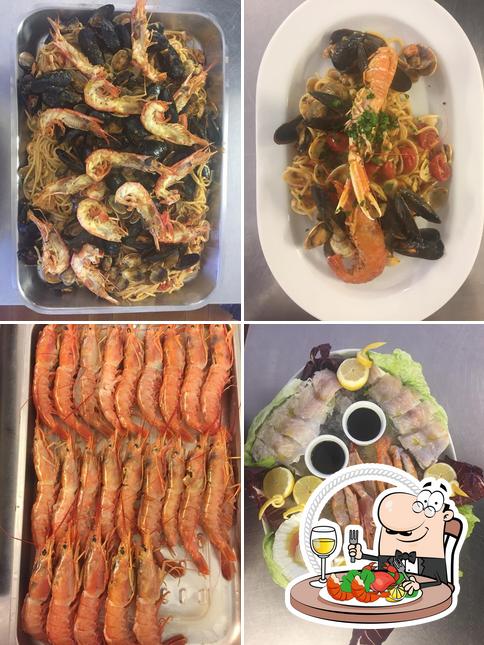 Try out various seafood meals served at Ristorante Albergo Merica