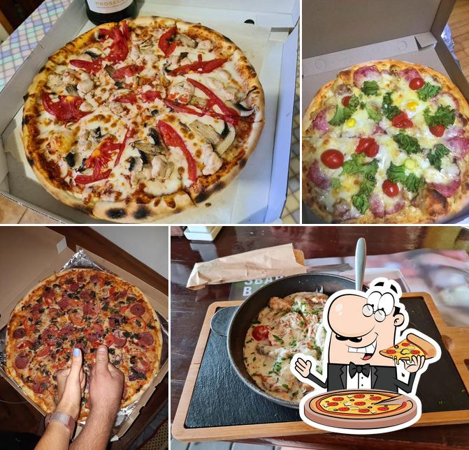 Try out pizza at Амбар - Кафе Доставка еды, суши Запорожье