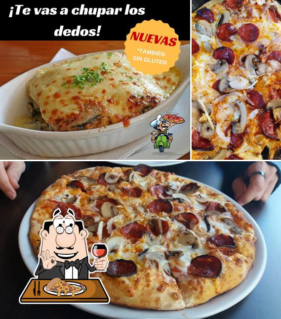 Get pizza at Pizzerías Carlos